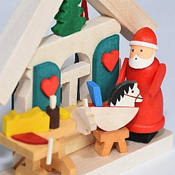 Kersthanger huisje van de kerstman in de werkplaats