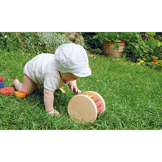 Grimm's Babyroller met bel regenboog kleuren